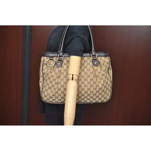 Authentic Gucci Tote (with keychain, pictured). - Picture 5 of 14